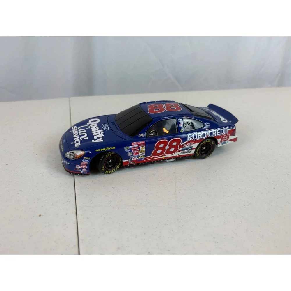 Dale Jarrett 88 Ford Quality Care Credit Taurus NASCAR 1:24 Diecast Car Blue